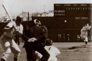 4/15/58 Ruben Gomez delivers the first pitch of West Coast Baseball.